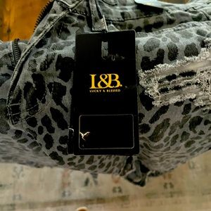 Brand new, never worn, cropped print jeans.